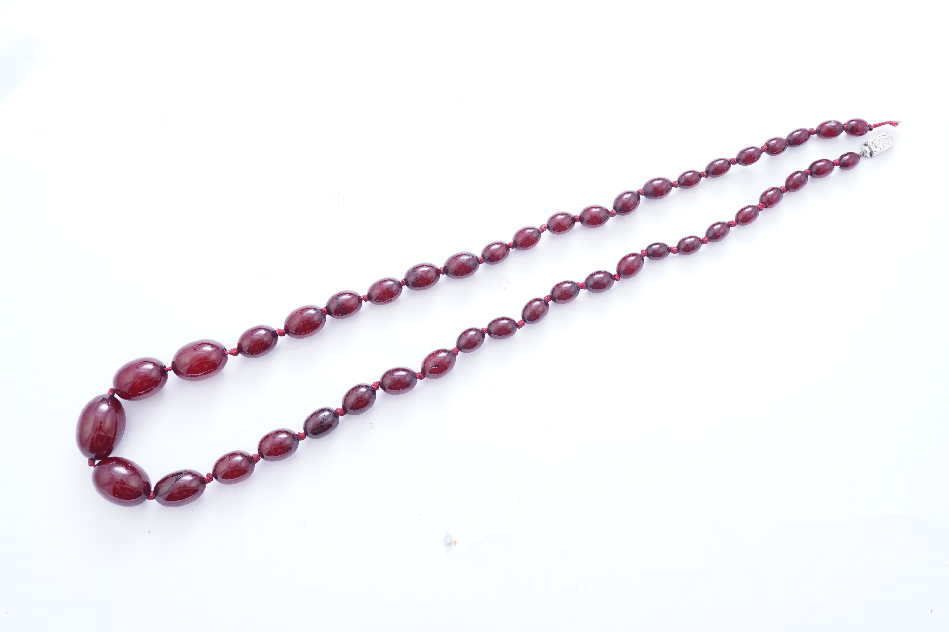 A cherry bakelite 'amber' necklace